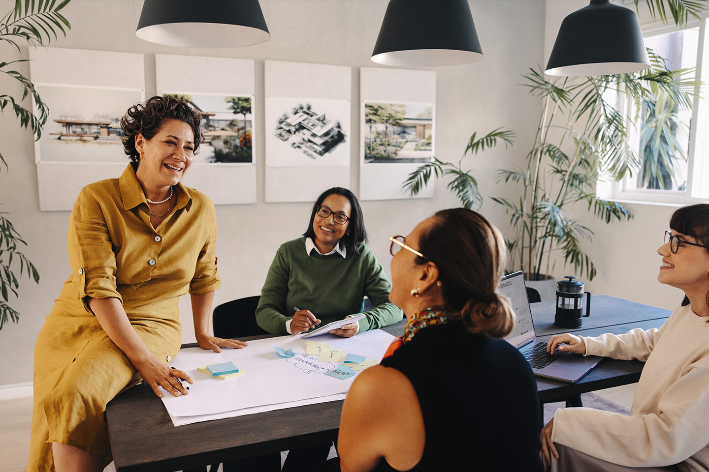 Sales presentation with various marketing materials present